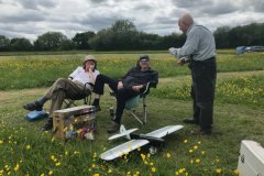 John makes a point to Glen and Roy